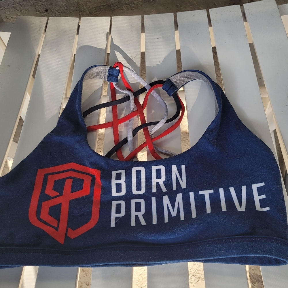 Born Primitive Navy Sports Bra with Red and White Accents